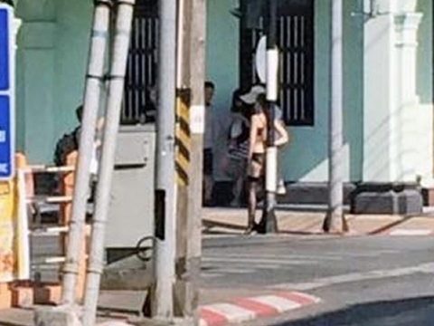 Lingerie clad foreign woman ruffles feathers in Phuket Town